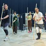 The company holding bamboo staffs.